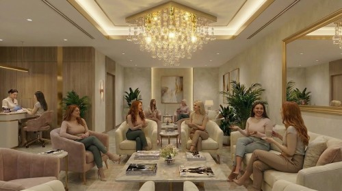 Poczekalnia salonu manicure z lustrem w złotych ramkach.jpg